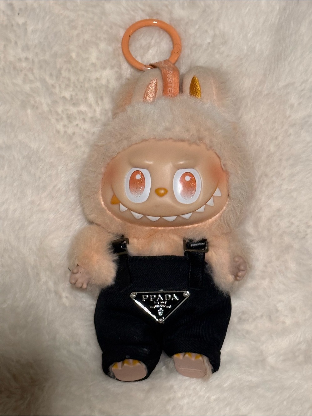 Designer Plush Keychain Doll in Peach with Black Overalls